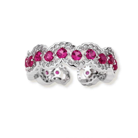 Ornate adjustable ring with pink cubic zirconia stones in white gold-plated copper setting with floral metalwork details