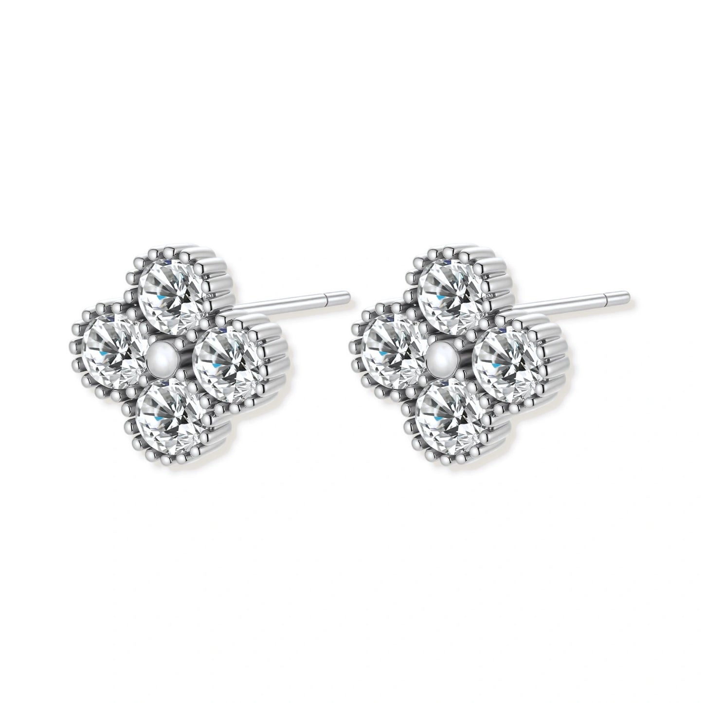 Dainty sterling silver quatrefoil stud earrings with four brilliant moissanite stones and center accent on white background.