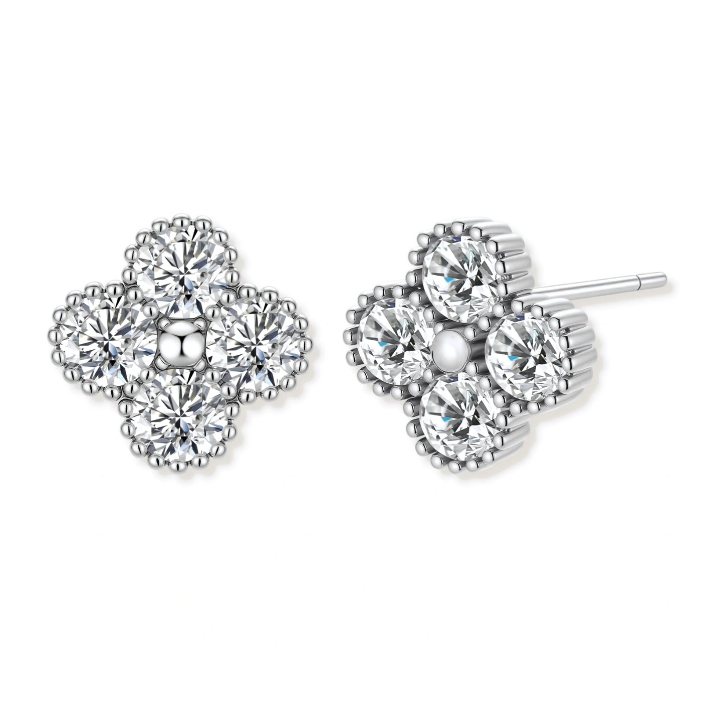 Dainty sterling silver quatrefoil stud earrings with four brilliant moissanite stones and center accent on white background.