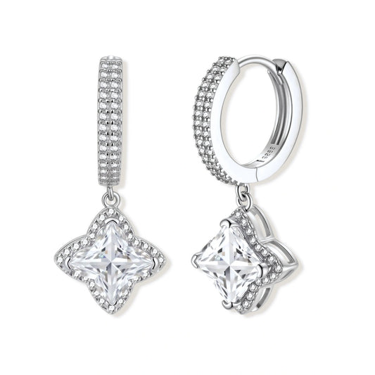 Sterling silver huggie hoops with geometric diamond-shaped moissanite dangles featuring pavé crystal details