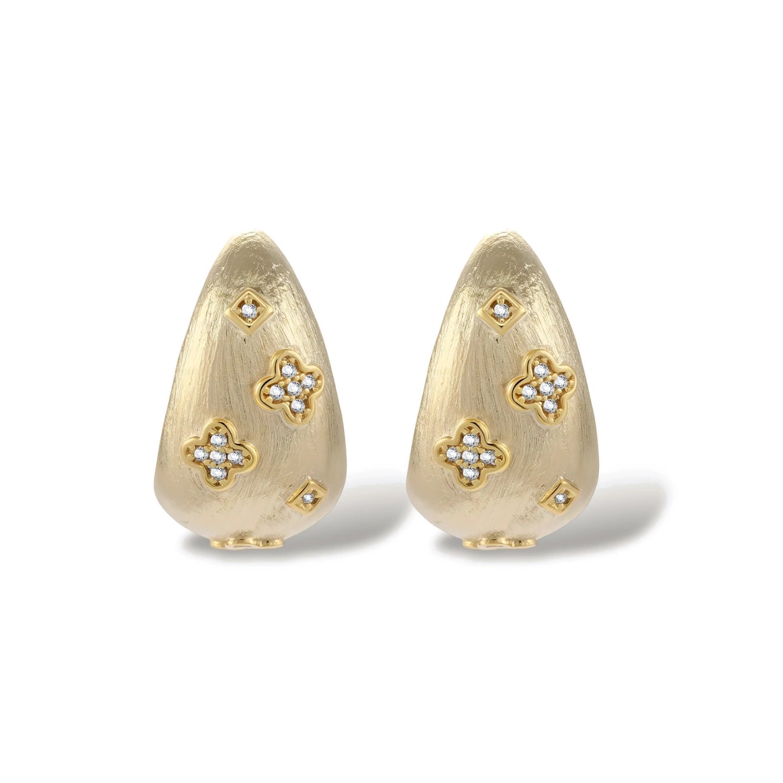 Curved gold-plated hoop earrings with four-leaf clover and diamond-shaped crystal details on white background