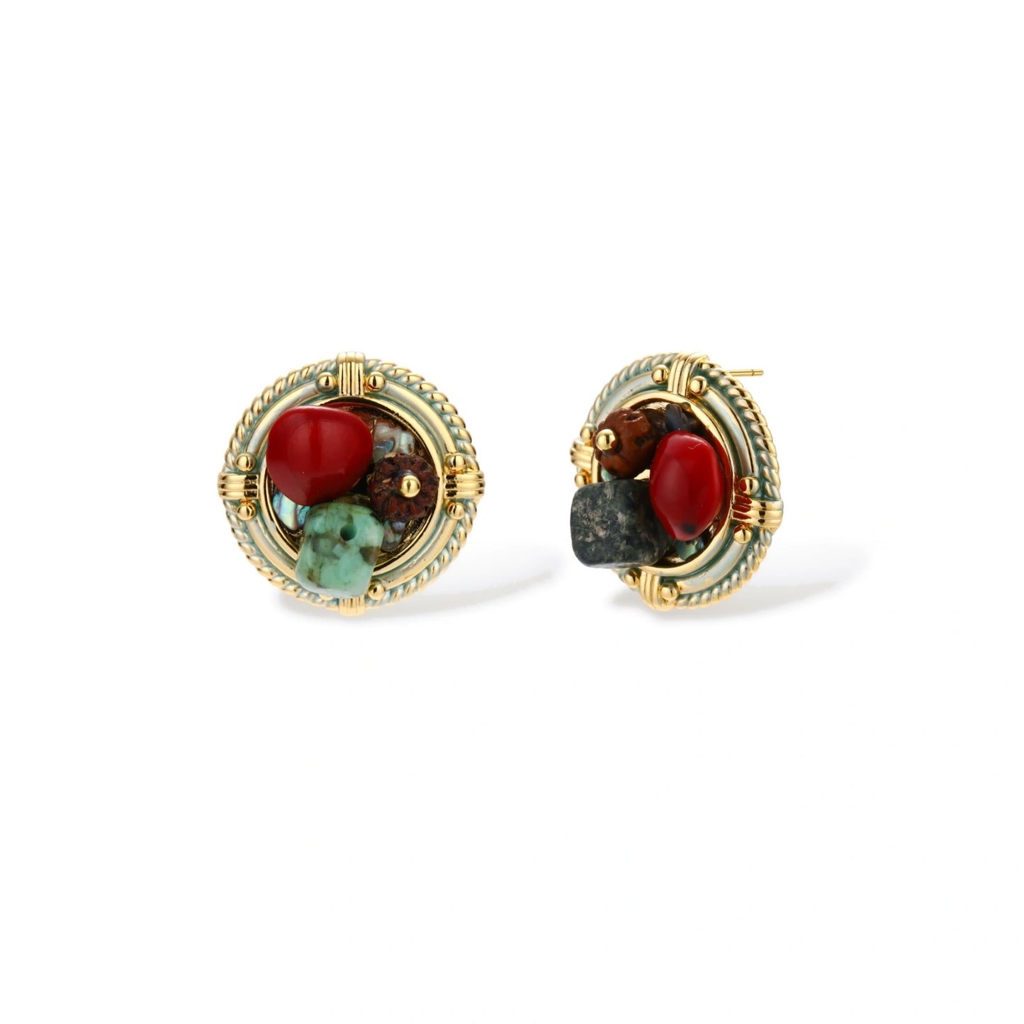 Circular gold-plated earrings with turquoise, coral, wood beads, and rope border detail on cream background.