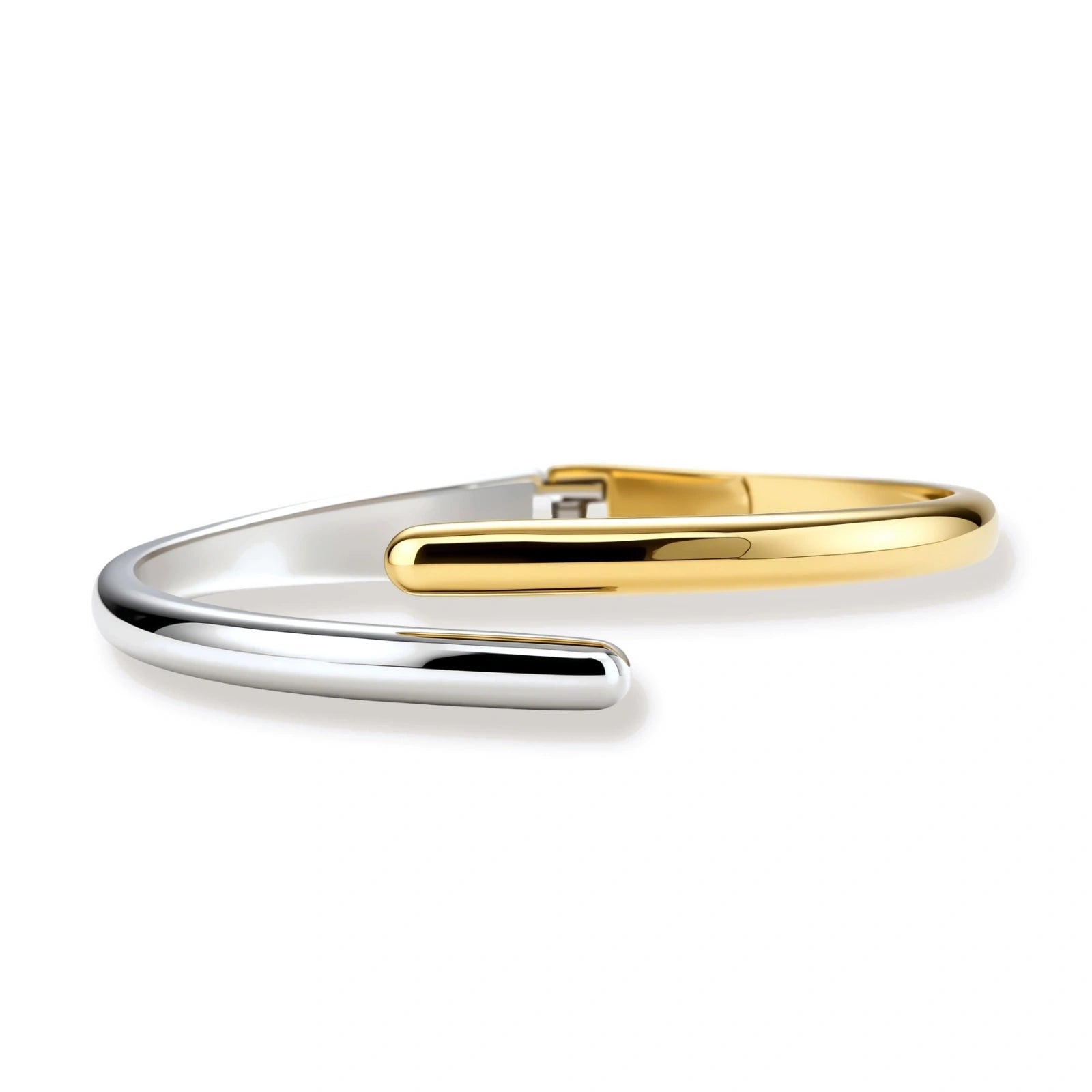 Polished two-tone bypass cuff bracelet in 18K gold plated and silver stainless steel with overlapping tapered ends.