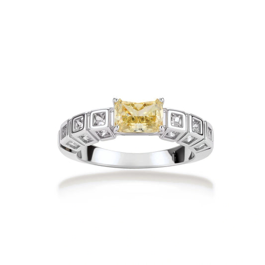 Adjustable ring with emerald-cut yellow zirconia center and clear accent stones in geometric platinum-plated setting