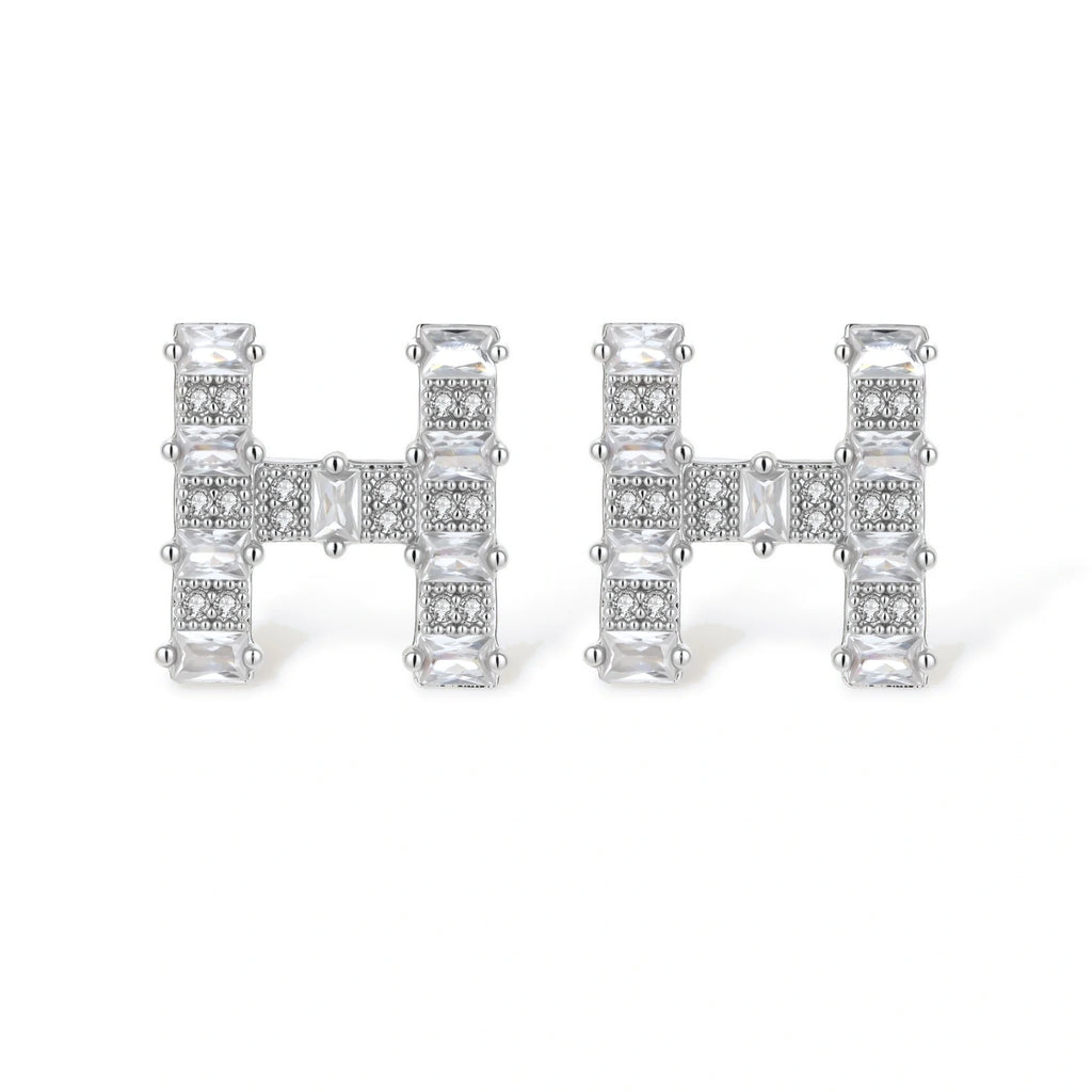 Letter H jewelry set featuring geometric crystal design in gold and white gold plated finish with adjustable chain necklace