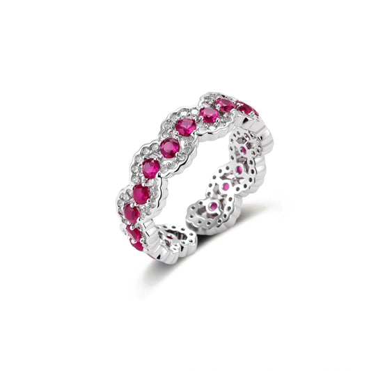 Ornate adjustable ring with pink cubic zirconia stones in white gold-plated copper setting with floral metalwork details