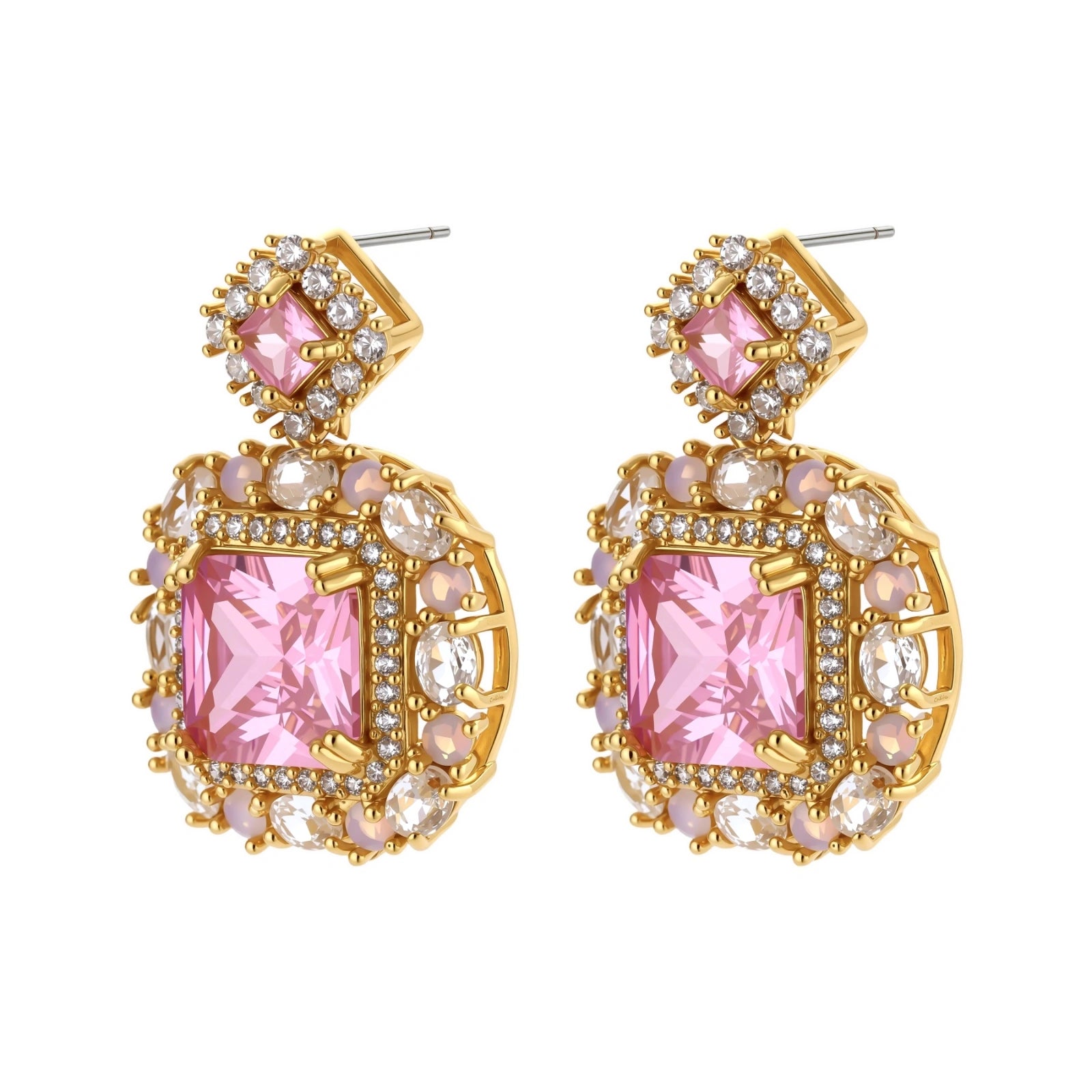 Ornate gold-plated jewelry set with rose pink zirconia center stones and crystal accents on cream background.