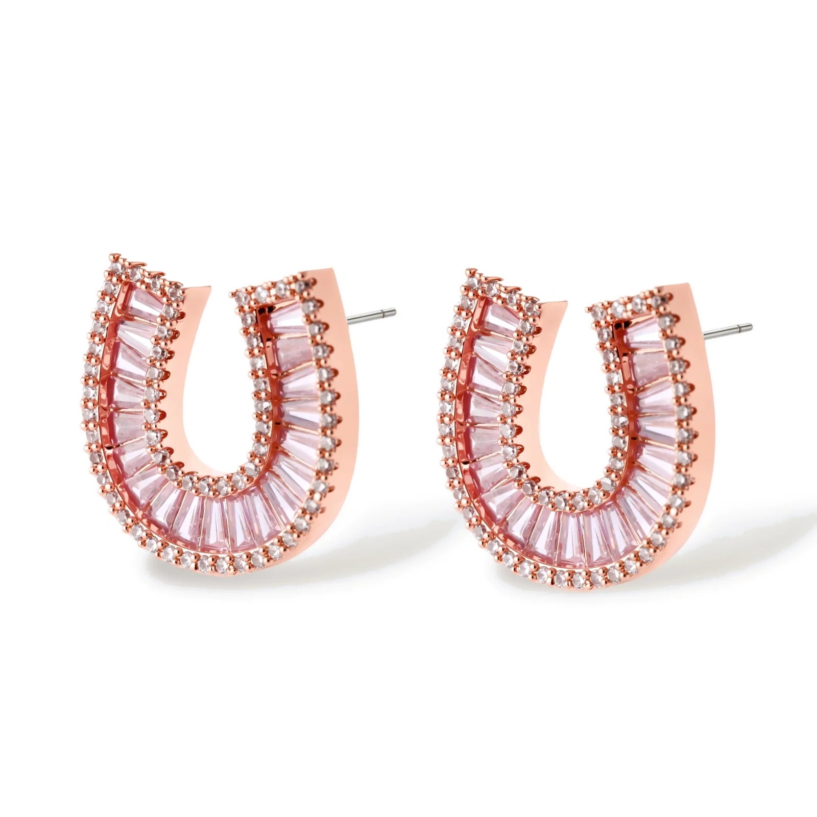 Sparkling horseshoe-shaped jewelry set with AAA cubic zirconia in gold-plated and white gold finishes on cream background.